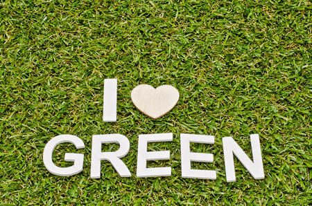 image concept word i love green made froom wood on artificial grassの写真素材
