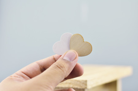 romantic look hand holding heart symbolの写真素材