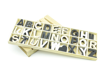 collection of uppercase typeface made from wood isolated white backgroundの写真素材
