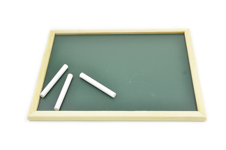 chalkboard and three piece of chalk isolated white backgroundの写真素材