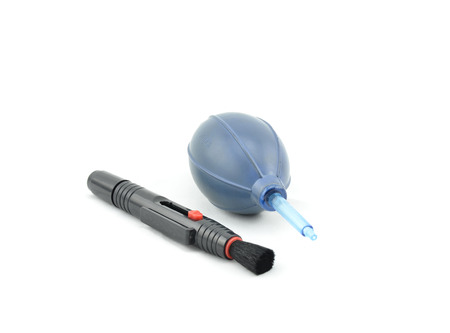 air blower with black lens pen placed side by side isolated white backgroundの写真素材
