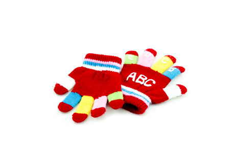 a pair red hand glove with alphabet  isolated white backgroundの写真素材