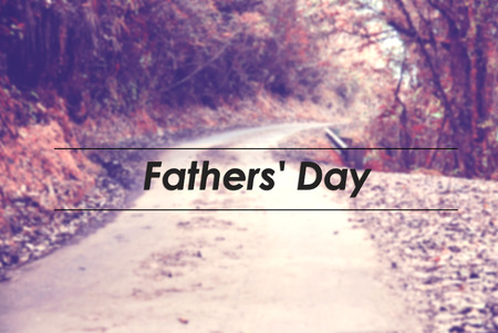 blurred image background of retro look color tone, pathway through the forest with word FATHER'S DAYの写真素材