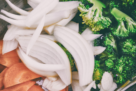 Closed up image of vegetables. Broccoli, carrot, onion and chili ready to cooked.の写真素材