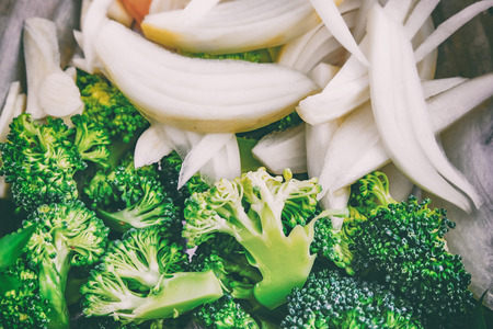 Closed up image of vegetables. Broccoli, carrot, onion and chili ready to cooked.の写真素材