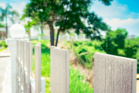 selective focus image of wooden fence at sunny day with blur backgroundの写真素材
