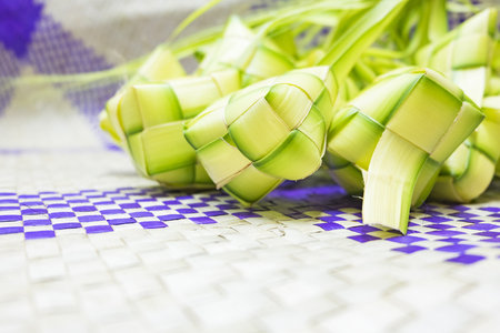 Ketupat or rice dumpling is Malaysian most iconic delicacy dish during eid mubarak.Natural rice wrapped with young coconut leave.の写真素材