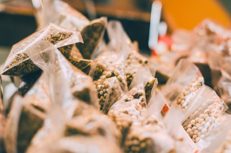 closed up image,variety of herbs packed in transparent plastic bagの写真素材