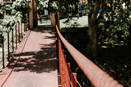 Hanging bridge under sunny day