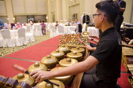 KUALA LUMPUR, MALAYSIA 12 JULY 2017: Group of Malaysian performing Gamelan Orchestra and modern music instrument on hotel stageのeditorial素材