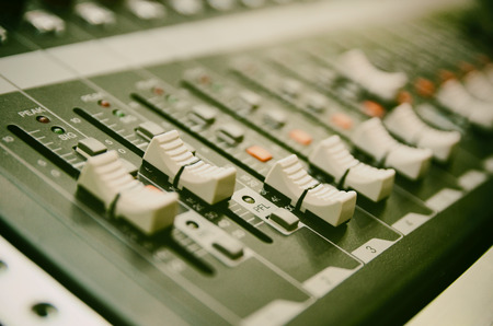 Selective focus professional audio mixing console panel.technology and entertainment concept