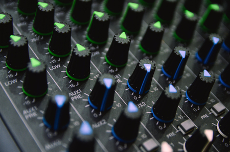 Selective focus professional audio mixing console panel.technology and entertainment concept