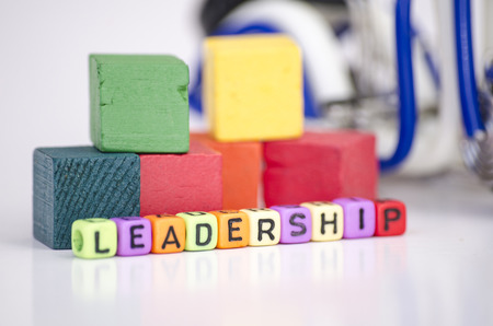 Business success and motivational concept dices cube with word LEADERSHIP with reflection.selective focus and shallow depth of fieldの写真素材