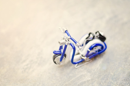 Handcrafted scooter souvenir background. selective focus and shallow depth of fieldの写真素材