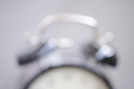 Cropped and closeup  vintage alarm clock for time management conceptの写真素材