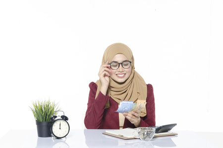 Business success concept, happy face women counting banknote or moneyの写真素材