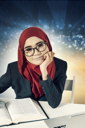 Creative ideas concept with abstract background, young professional entrepreneur sitting and smile の写真素材