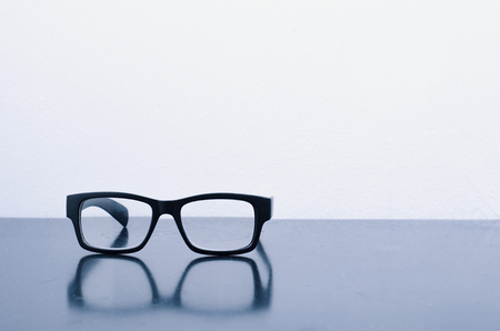 Conceptual photograph of life, spectacles with matte black frameの写真素材