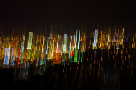 abstract defocus of colorful glittering shine bulbs lights backgroundの写真素材