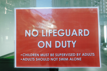 printed signage â€œ NO LIFEGUARD ON DUTYâ€ for public attention