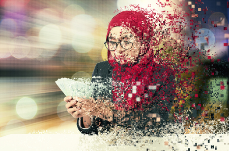 abstract and dispersion effect of happy expression young business woman holding money for busness success concept word conceptの写真素材