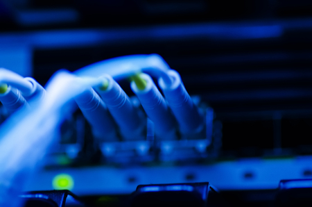 Data transfer by optical fibre on core network switch. selective focus shotの写真素材