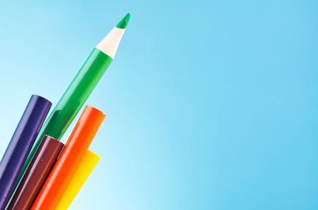close-up image of colourful pencils over beautiful reverberation gradient backgroundの写真素材