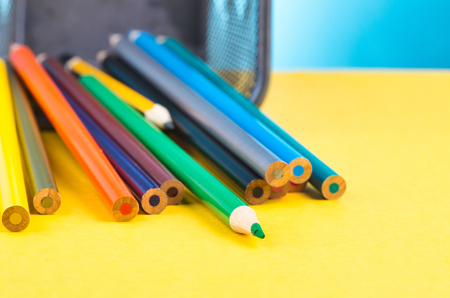 close-up image of colourful pencils over beautiful reverberation gradient backgroundの写真素材