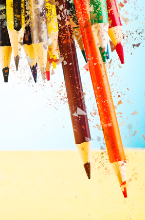 close-up image of colourful pencils over beautiful reverberation gradient backgroundの写真素材