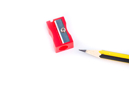 Back To school Concept, pencil and sharpener over white backgroundの写真素材