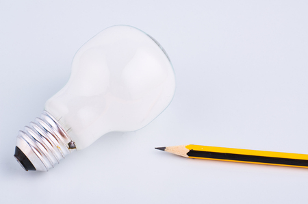 pencil and bulb over white background for creative ideas conceptの写真素材