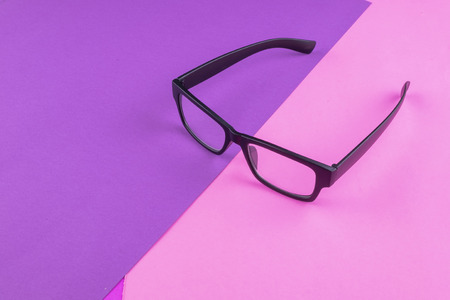 health concept,eye glasses spectacles with shiny black frame on pastel color background.copy space for textの写真素材