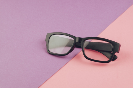 health concept,eye glasses spectacles with shiny black frame on pastel color background.copy space for textの写真素材