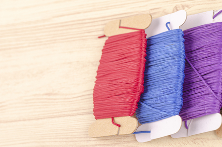 colorful stacking cotton yarn wool over beautiful reverberation gradient background.の写真素材