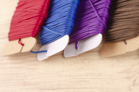 colorful stacking cotton yarn wool over beautiful reverberation gradient background.の写真素材