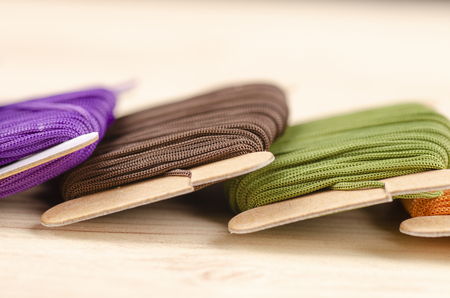 colorful stacking cotton yarn wool over beautiful reverberation gradient background.の写真素材