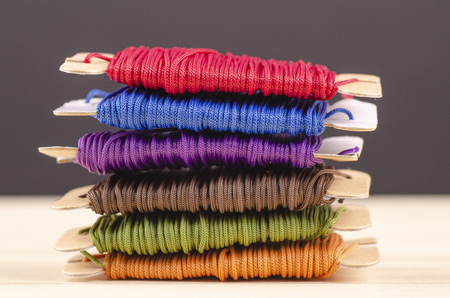 colorful stacking cotton yarn wool over beautiful reverberation gradient background.の写真素材