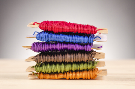 colorful stacking cotton yarn wool over beautiful reverberation gradient background.の写真素材