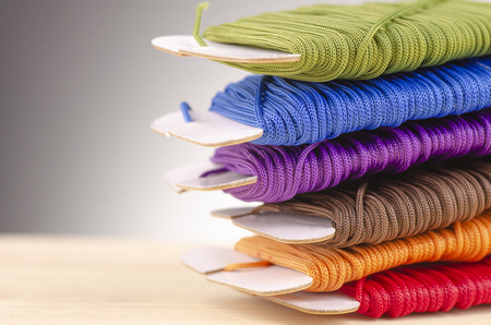 colorful stacking cotton yarn wool over beautiful reverberation gradient background.の写真素材