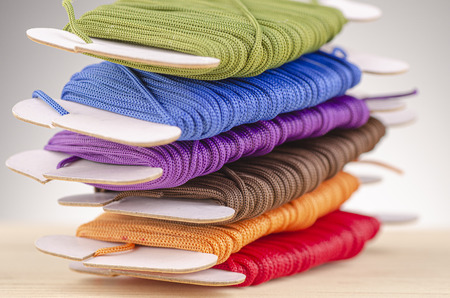 colorful stacking cotton yarn wool over beautiful reverberation gradient background.の写真素材