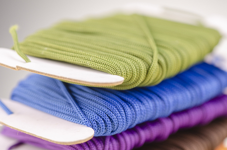 colorful stacking cotton yarn wool over beautiful reverberation gradient background.の写真素材
