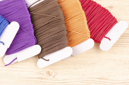 colorful stacking cotton yarn wool over beautiful reverberation gradient background.の写真素材