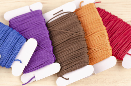 colorful stacking cotton yarn wool over beautiful reverberation gradient background.の写真素材