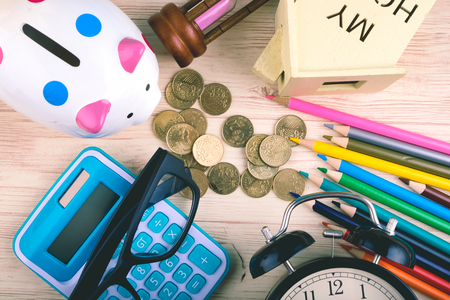 flat lay top view shot, scattered home office workspace or desk concept with accessories and stationeryの写真素材