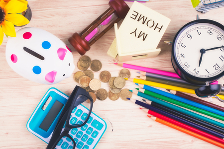 flat lay top view shot, scattered home office workspace or desk concept with accessories and stationeryの写真素材