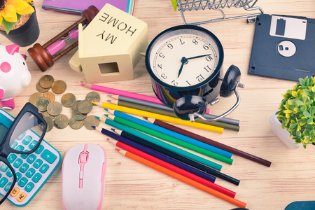 flat lay top view shot, scattered home office workspace or desk concept with accessories and stationeryの写真素材
