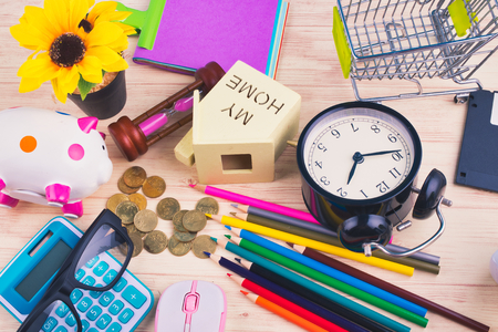 flat lay top view shot, scattered home office workspace or desk concept with accessories and stationeryの写真素材
