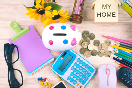 flat lay top view shot, scattered home office workspace or desk concept with accessories and stationeryの写真素材