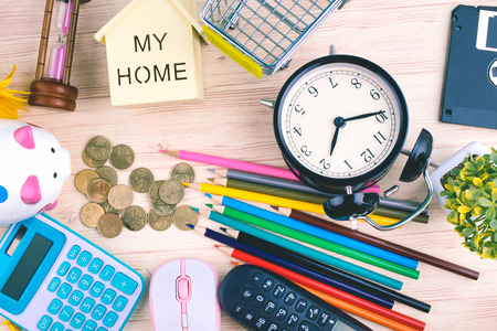 flat lay top view shot, scattered home office workspace or desk concept with accessories and stationeryの写真素材