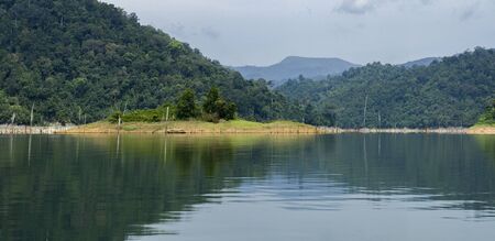 Beautiful image of rain-forest with reflection in water at Royal Belum State Park, Gerik Perak Malaysia.の写真素材